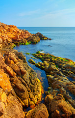 Fototapeta na wymiar Beautiful landscape with rocky shore and blue sea