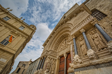 Beautiful architecture of entrance door of Church of Saint Trophime. The portal and entrance of the St-Trophime church in Arles, Provence, Bouches-du-Rhône, France