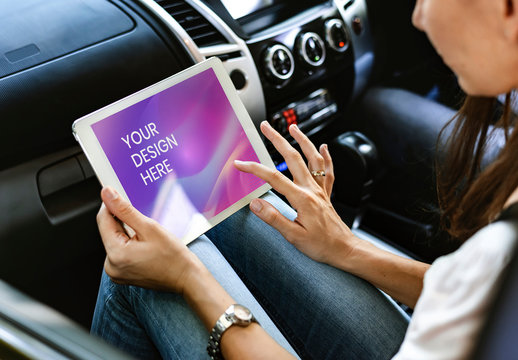 Person Using Tablet Mockup in a Car
