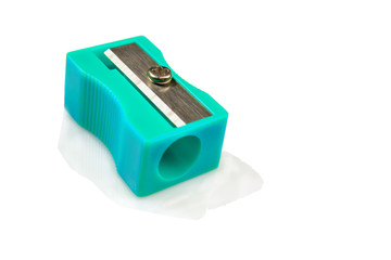 Large pencil sharpener on a white isolated background, close-up with space for the text.