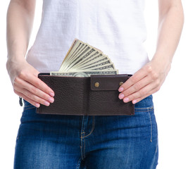 Woman holding in hand money dollars wallet on white background. Isolation