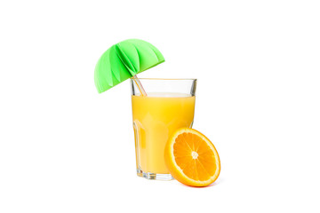 Glass of fresh orange juice with decorative palm and orange isolated on white background. Fresh natural drink