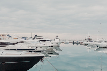 May 2019, Sochi - yachts in the seaport of Sochi, calm, blue sky. Horizontal picture.