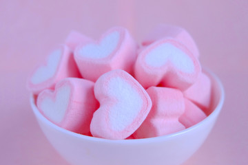 Pink marshmallow background, Heart marshmallow in white cup, Valentine background