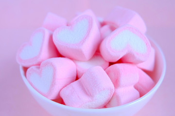 Pink marshmallow background, Heart marshmallow in white cup, Valentine background