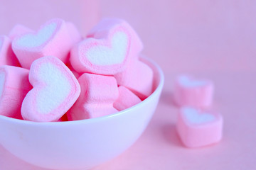 Pink marshmallow background, Heart marshmallow in white cup, Valentine background