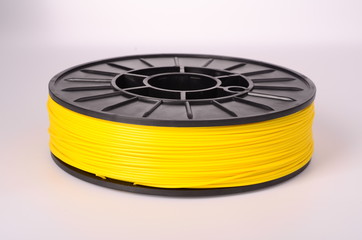 Filament for 3D Printer crystal clear and bright against a bright background.