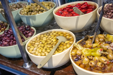 Assorted olives for sale in a supermarket