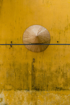 Vietnamese bamboo hat stuck on the wall