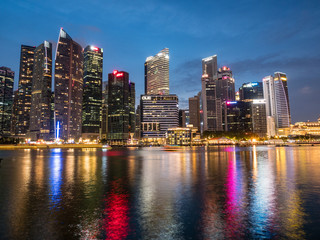 Singapore skyline at night overlooking the river and business district
