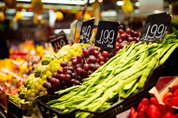 Vegetable stall on bazaar with colorful vegetables and fruits