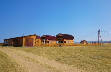 Wooden houses on the island. Village. Olkhon Island. Baikal summer.