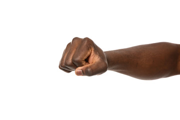 African-American man showing fist on white background, closeup