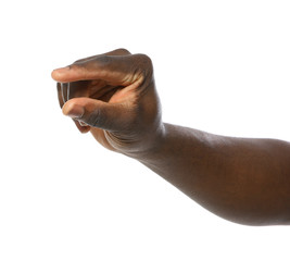 Fototapeta premium African-American man holding something in hand on white background, closeup