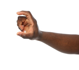 African-American man holding something in hand on white background, closeup
