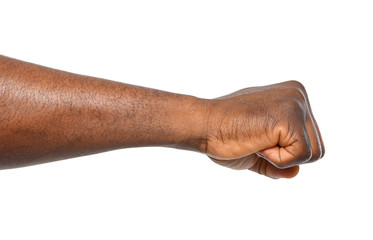 African-American man showing fist on white background, closeup