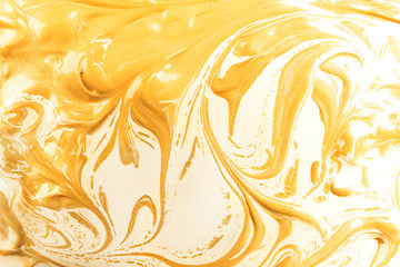 Beautiful abstract drawing made with gold paint as background