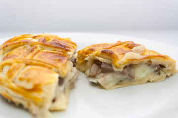 traditional English shepherd's pie cut into pieces