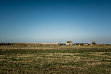 Fototapeta premium Farm. Old barn and pigsty of a small farm in Moldova.