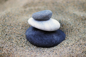 Fototapeta na wymiar Pebbles on sand