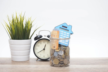 financial concept, calculator, coin and paper money