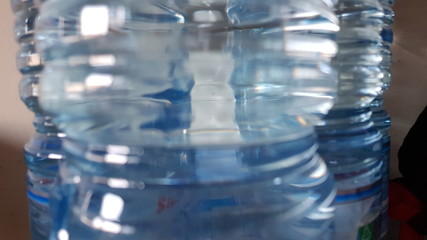 close up of plastic bottles full of water
