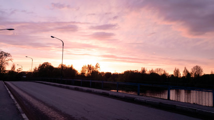 Bridge car at sunset. Road bridge in the evening.