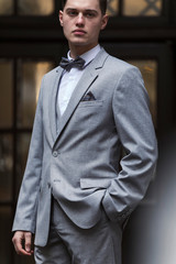 Modern businessman. Confident young man in full suit