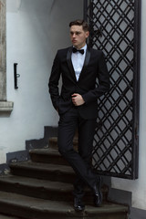 Modern businessman. Confident young man in full suit