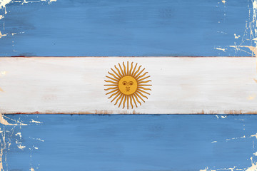 Flaga Argentyny malowana na starej desce. © Edwardkarczmarski