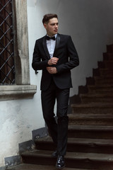 Modern businessman. Confident young man in full suit
