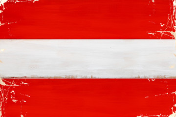 Flaga Austrii malowana na starej desce. - obrazy, fototapety, plakaty