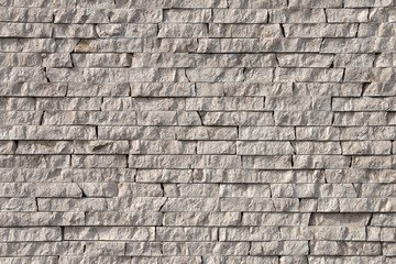 Background, texture, laying natural stone light gray tint.