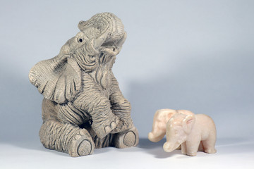 elephant figurine with elephants on a white background