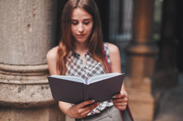 Obraz premium Cheerful student near the campus