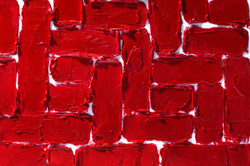Smudged red lipstick texture pattern background. Macro cosmetic product photography