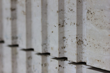 natural Italian travertine stone, light beige color. facade decoration. natural stone texture italian marble for print and ceramic tiles 