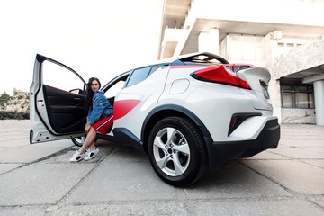Happy young girl with new car. Woman city driver..Business lady motorist