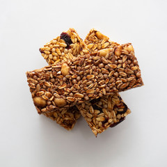granola bars on the white background top view 