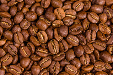Background of many roasted coffee beans