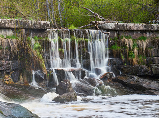 Fototapeta na wymiar Old dam and waterfall