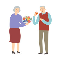 Old man and woman eating fruits and vegetables