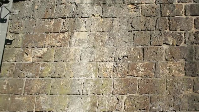 View from French RER Transilien train driving fast with City search of Paris in background entering underground tunnel 