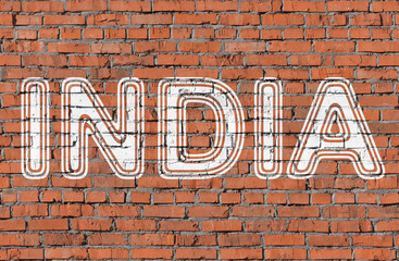 India. Inscription on the seamless brickwall.