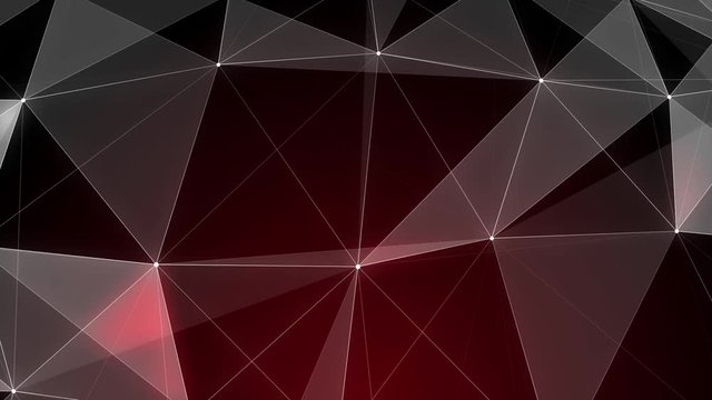 Red triangle polygons. Computer generated seamless loop geometric background. 4k UHD (3840x2160)