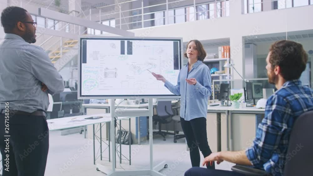 Poster in the in industrial design facility team of engineers and technicians have a meeting, female specia