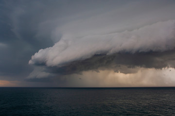 Fototapeta na wymiar Dramatic Afternoon Storm over the Ocean 