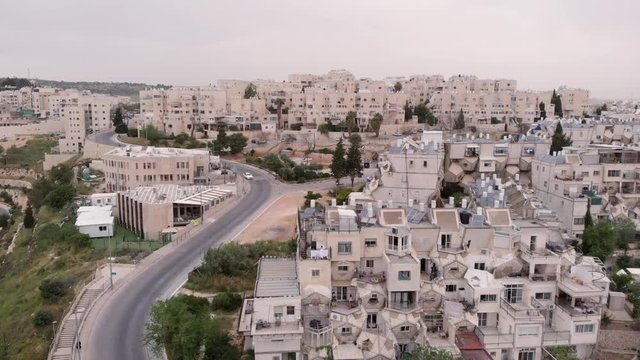 Flying over orthodox jewish neighborhood in Jerusalem   Aerial view over Ramot orthodox jewish neighborhood in Jerusalem