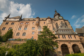 Fototapeta na wymiar Marburg Castle (Landgrafenschloss) on top Schlossberg in the German city of Marburg