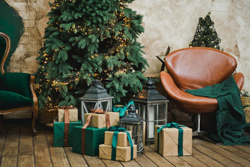 Living room in retro style with a Christmas decor. Christmas living room with sofa, Christmas tree and gifts. New year home interior background. Green, brown, golden color.